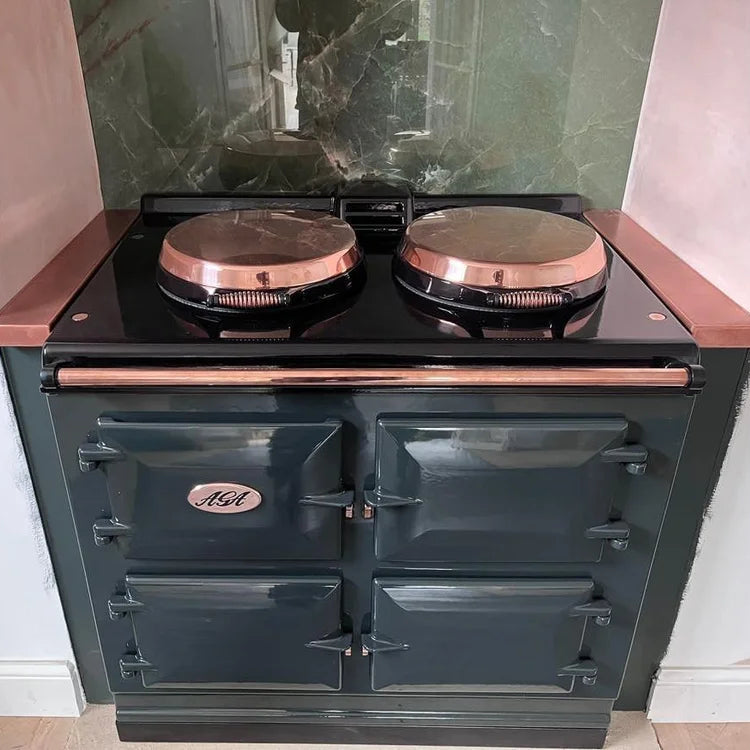 aga with copper finishes