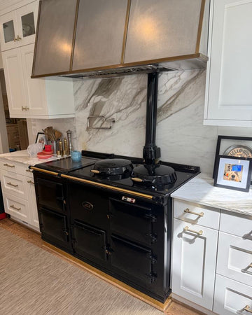 black aga refurbishment in marble kitchen usa