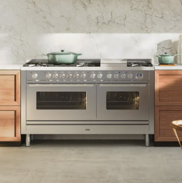 ilve roma stainless steel cooker in wood and marble kitchen