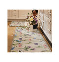 floral hug rug with child and flower vase